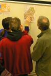 people looking at map